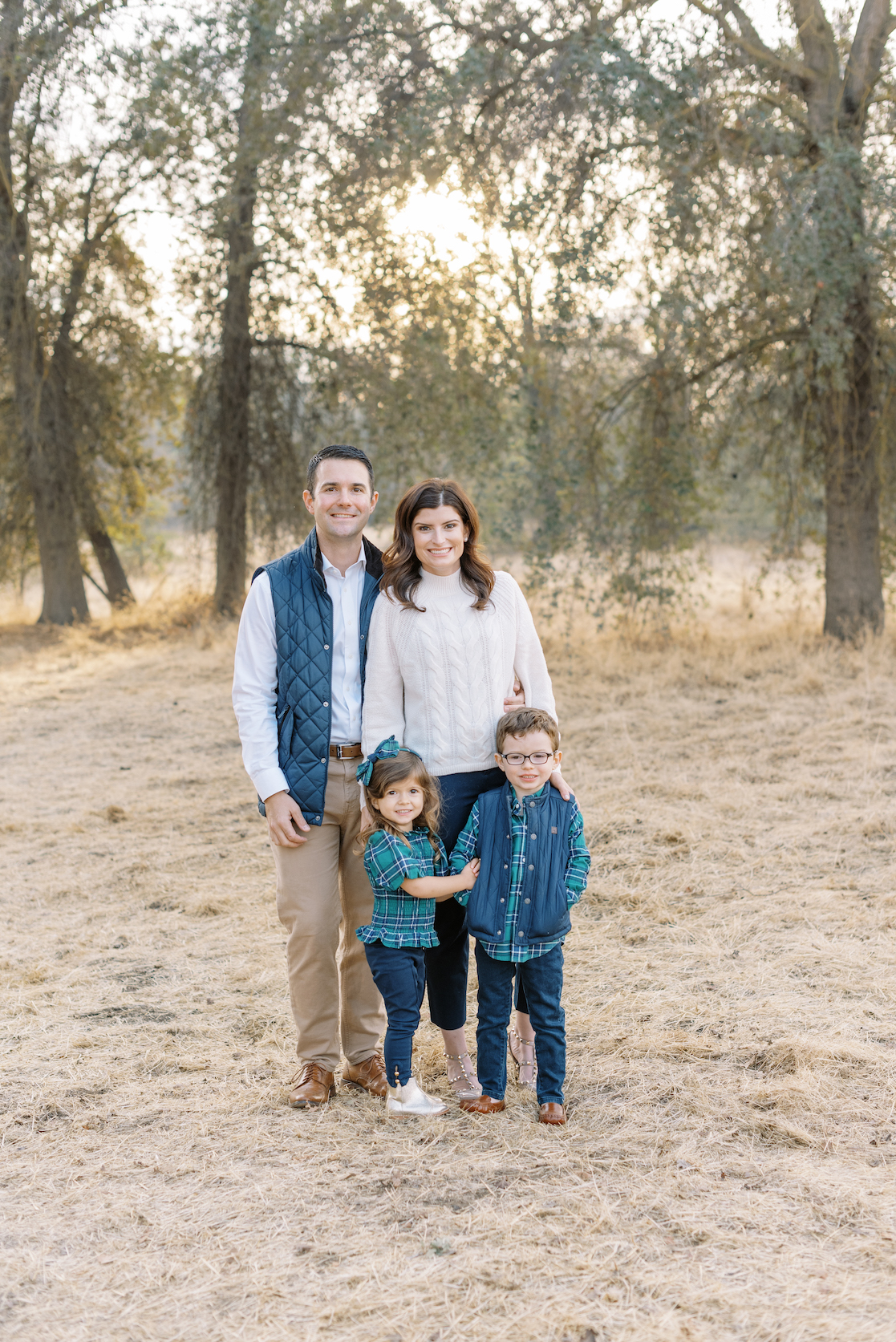 posed family portrait of parents, son, and daughter for holiday card