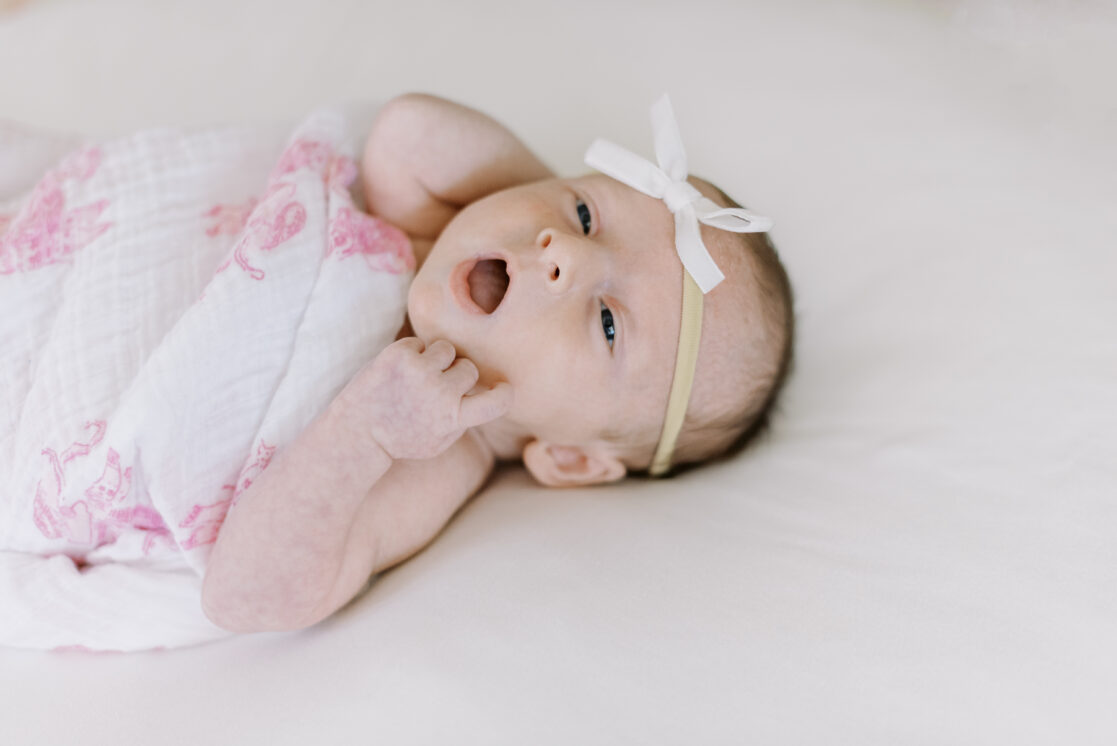 newborn baby yawning