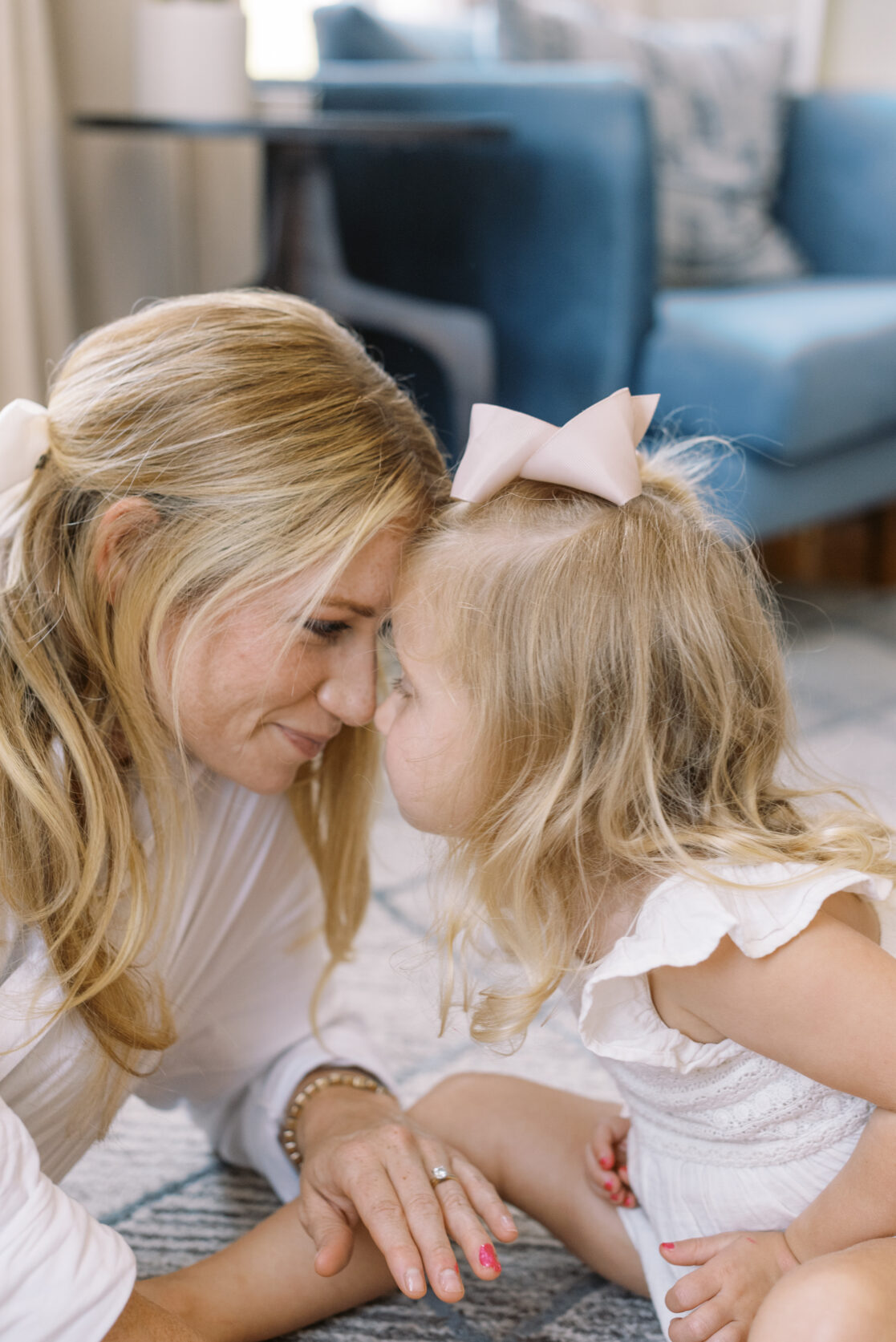 mom snuggling with daughter nose to nose fun family photos in Richmond by Jacqueline Aimee Portraits 