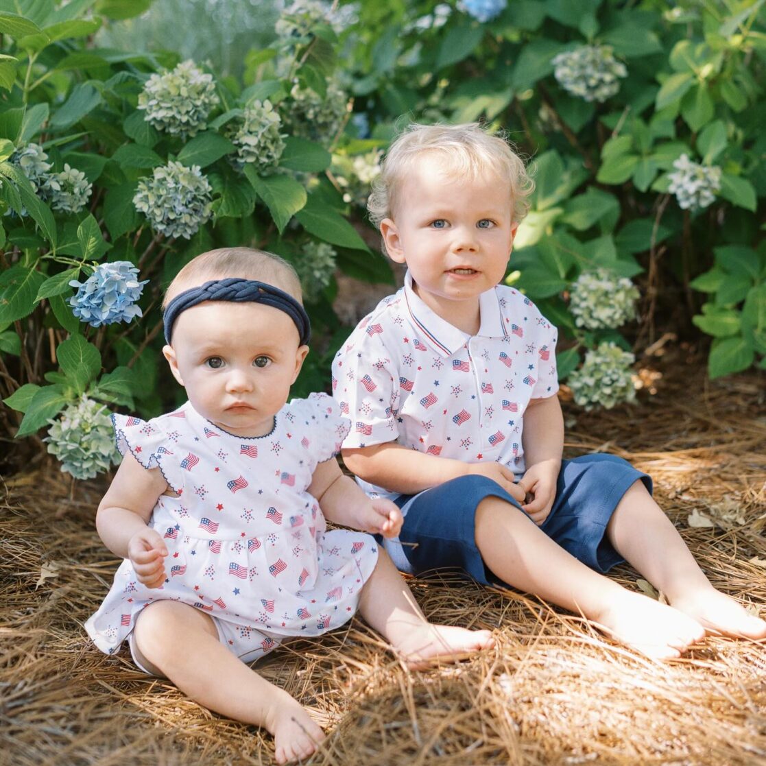 4th of July events in Richmond | Photo of a brother and sister in matching patriotic clothes looking at the camera and smiling by Richmond family photographer Jacqueline Aimee Portraits