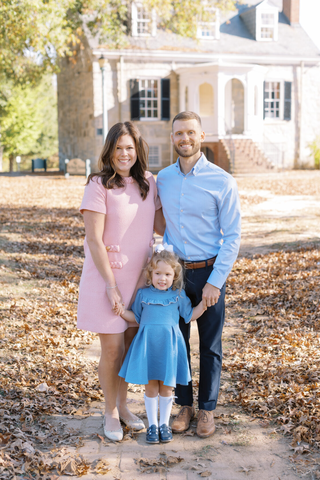 Richmond VA Fall Family Photos | a Family poses before golden, leaves in a Richmond park during autumn