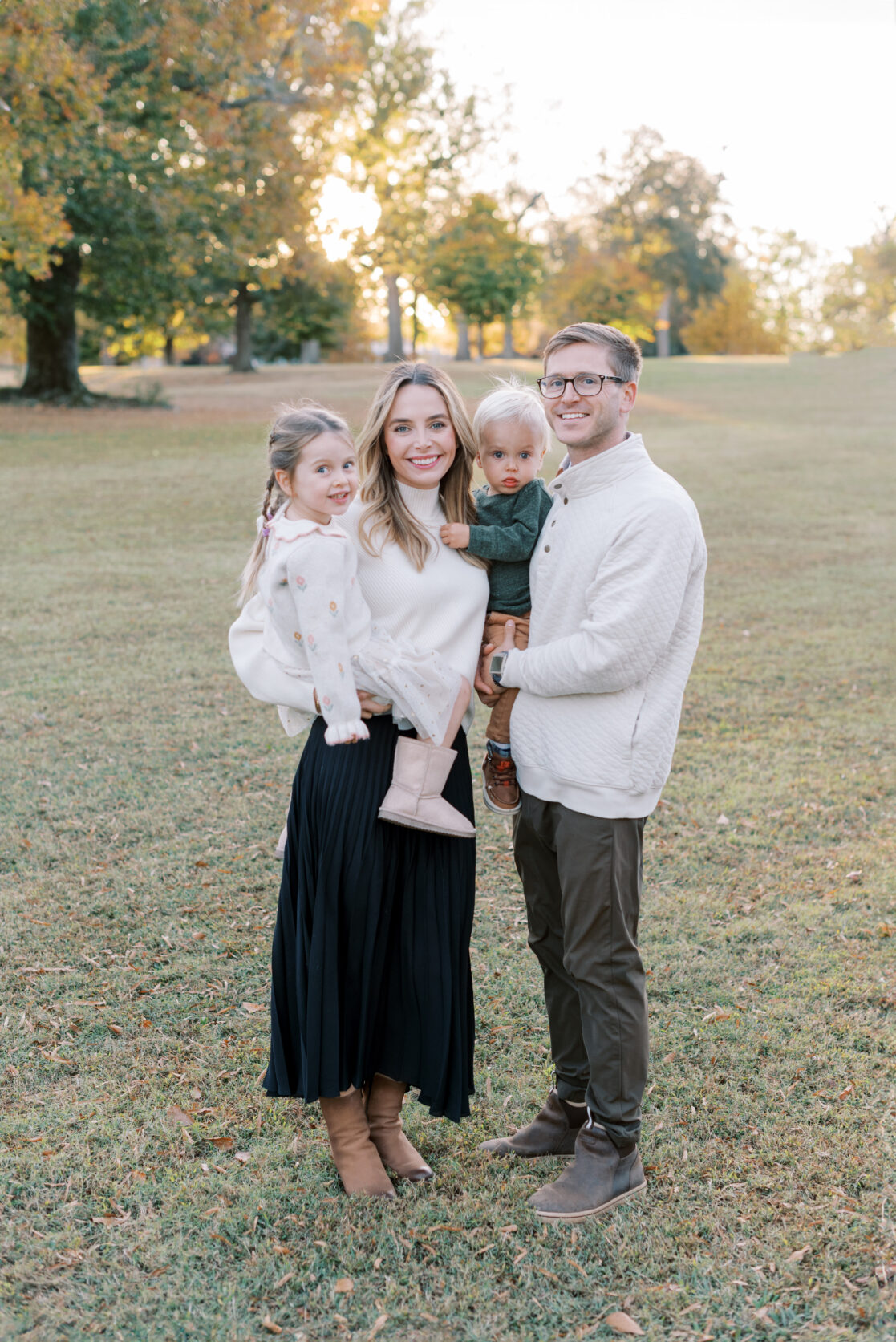 Richmond VA Fall Family Photos | a Family poses before golden, leaves in a Richmond park during autumn