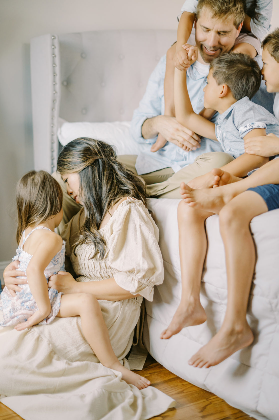 Photo of family playing together by Richmond family photographer Jacqueline Aimee Portraits