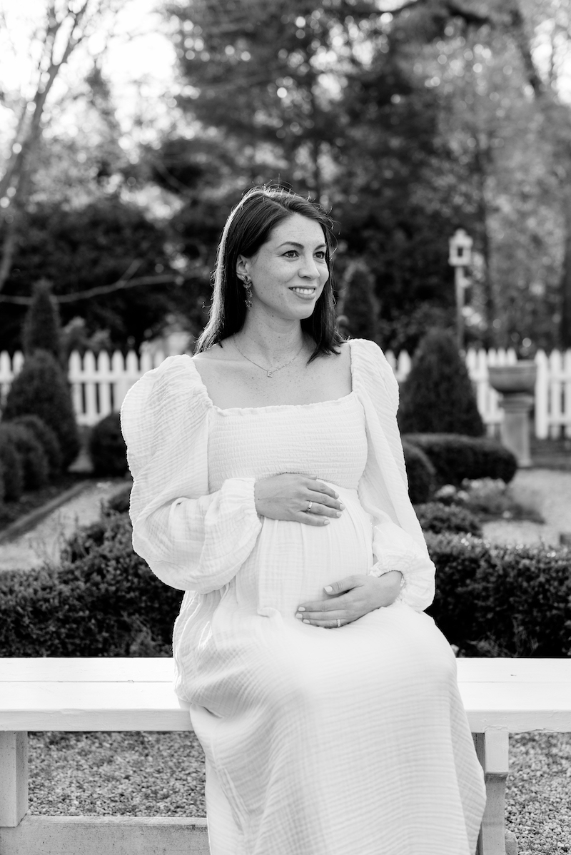 Richmond-maternity-photographer-mother maternity portrait in spring garden in black and white
